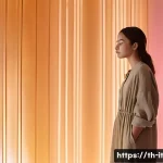 다감각 예술 경험 디자인에서의 커뮤니케이션 기술 - **Prompt 1: Immersive Sensory Journey**
    "A young adult, gender-neutral, stands quietly in an imm...